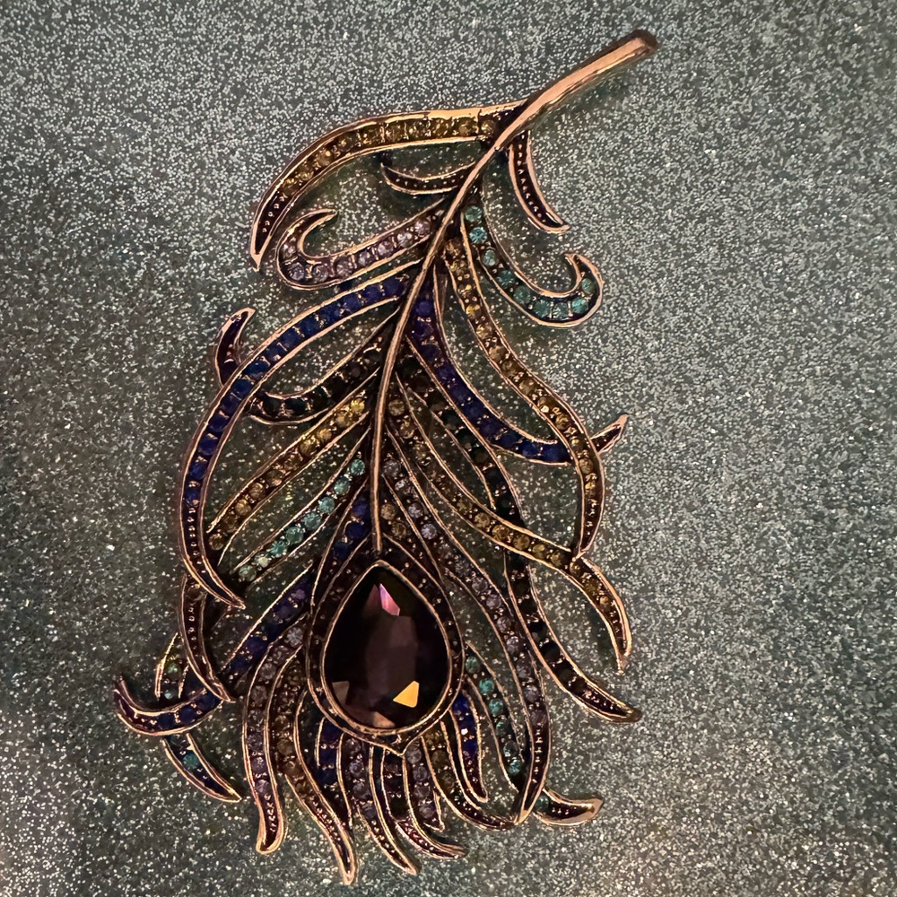 Peacock Feather Brooch with Purple Gem